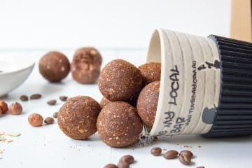 image of mocha bliss balls tumbling out of coffee cup