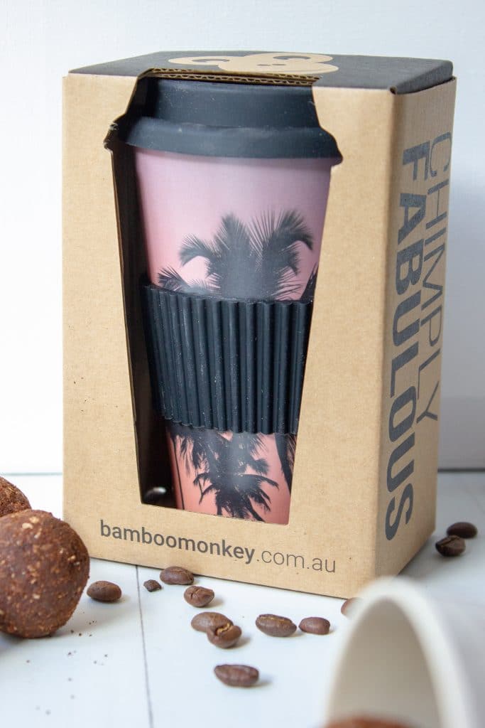 Picture of Bamboo Monkey Reusable Coffee Cup with packaging.