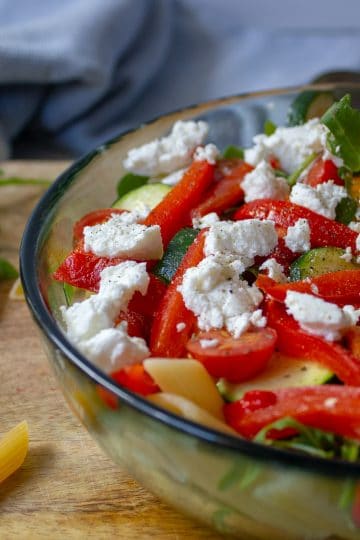 image of roasted vegetable and rocket salad with goats cheese in a bowl