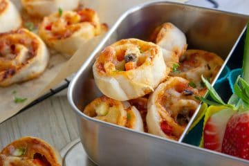 picture of pizza scrolls in a lunchbox