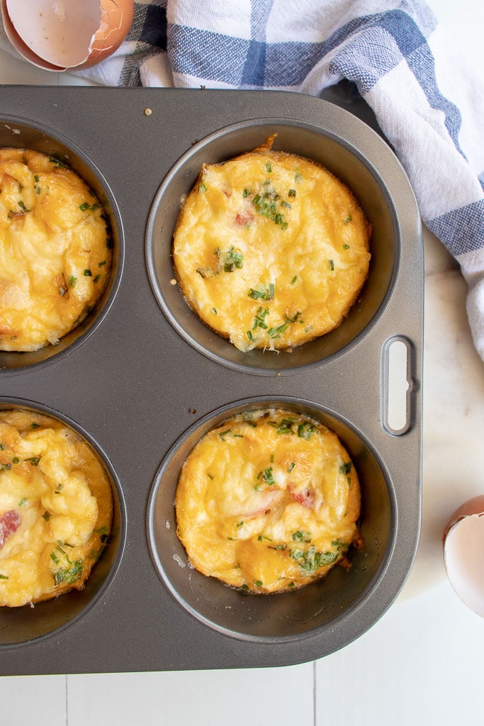 close up of cooked egg muffin in muffin tin