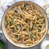 A large pan of cooked Creamy Mushroom Spinach Pasta