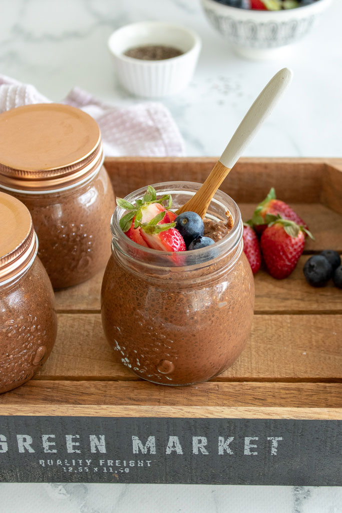 Chocolate Chia Seed Pudding in a jar with a spoon