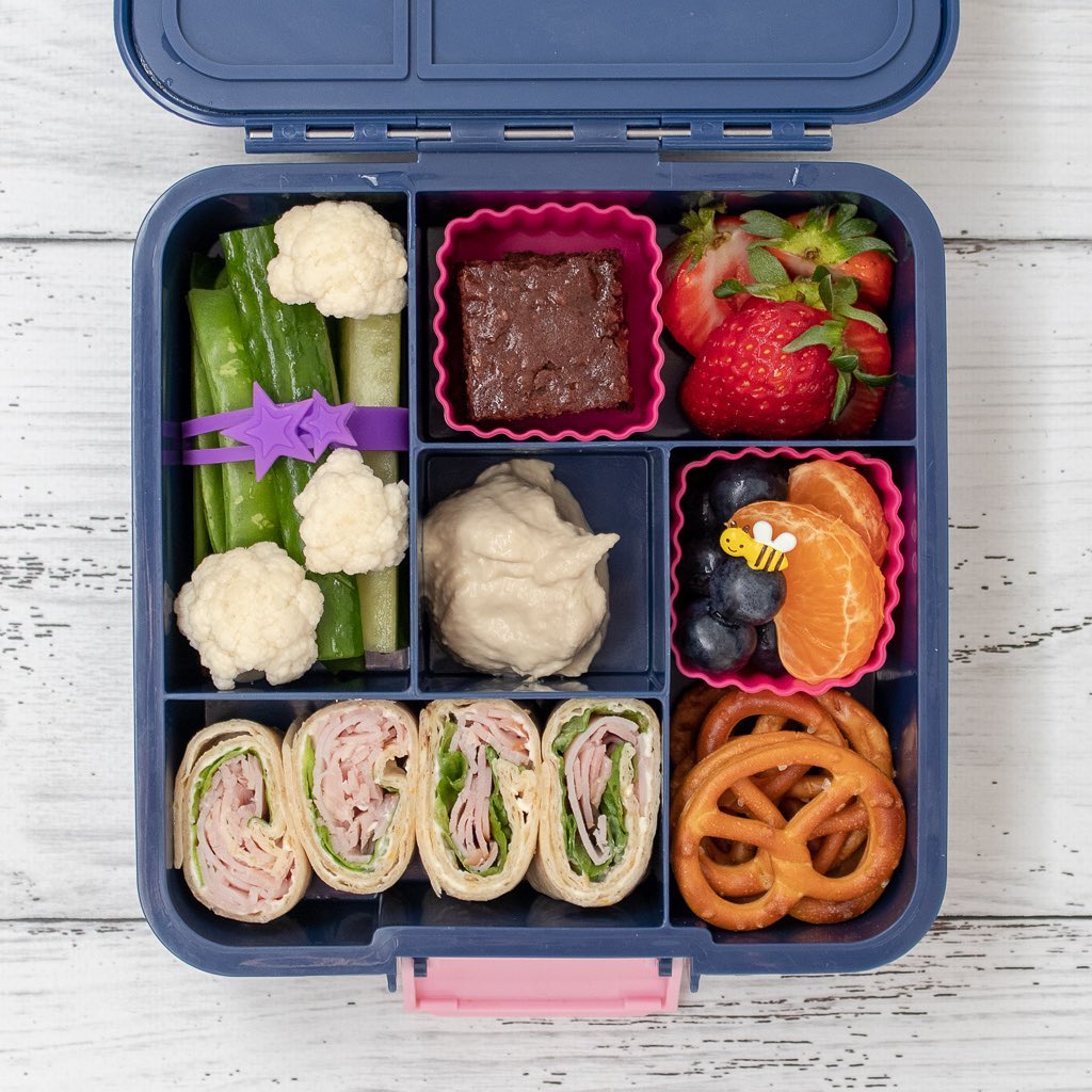 Isn’t it funny what some kids love. Miss 6 is my adventurous eater with a pretty mature palate.

She loves prawns and mushrooms and is happy to try new foods. She also happens to love raw cauliflower so that’s what I’ve treated her with in this little lunch🥰

What foods do your kids love that surprise you?

In the bento five:
➕hummus
➕snow peas cucumber sticks and cauliflower
➕Healthier Chocolate Brownie (recipe on the blog, link in profile @goodiegoodielunchbox or goodiegoodielunchbox.com.au)
➕strawberries
➕mandarin and blueberries
➕pretzels
➕wraps with ham lettuce and cream cheese

Happy Friday…we made it 😵‍💫